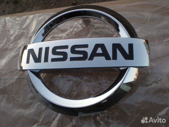 Эмблема решётки радиатора Nissan X-Trail T32 Teana