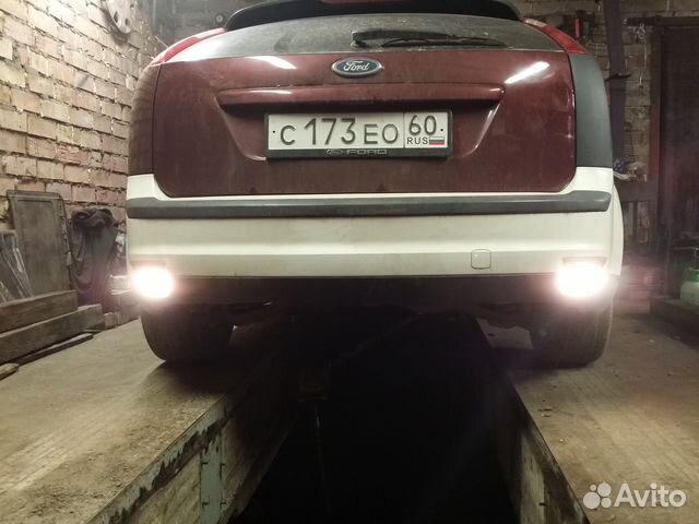Фонарь заднего хода левый Ford Focus 2