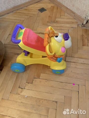 Каталка лев fisher price