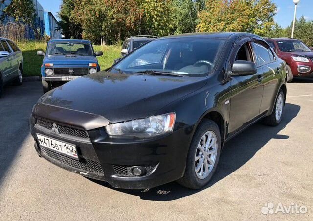Mitsubishi Lancer 10 решетка бампера