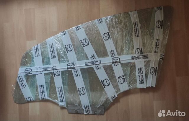 Стекло двери левой передней Opel Corsa D