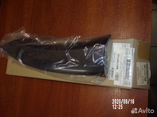 Накладка заднего крыла левого mitsubishi outlander