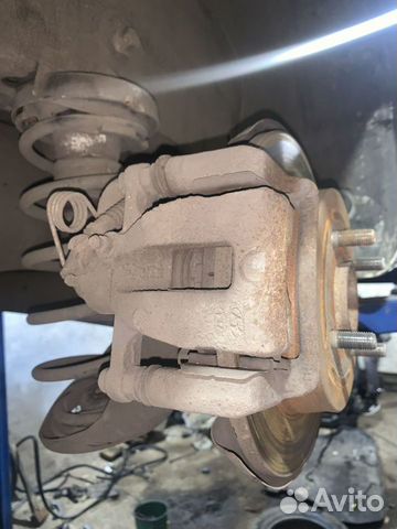 Суппорт задний правый Kia Rio 3 Solaris