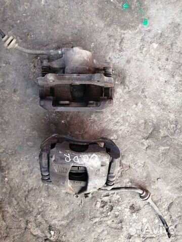 Суппорт передний левый Правый Опель Корса Д