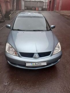 Mitsubishi Lancer 1.6 МТ, 2009, 140 000 км