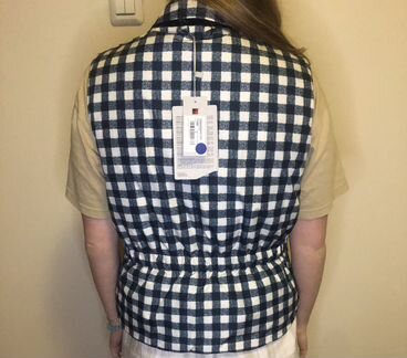 Жилетка пуховая женская