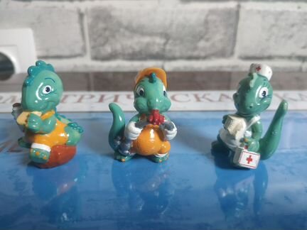 Единички из серии киндер Динозавры строители 1995